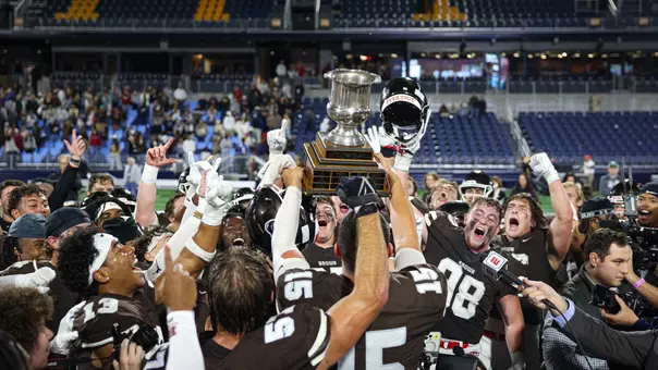 Brown celebrates with the Governor's Cup on October 3, 2025 at Centreville Bank Stadium