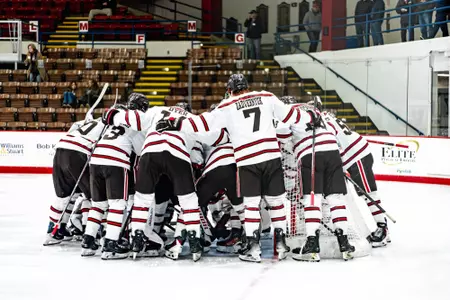 Men's Hockey Huddle Against Princeton