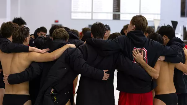 Men's Swim & Dive Huddle Against Yale