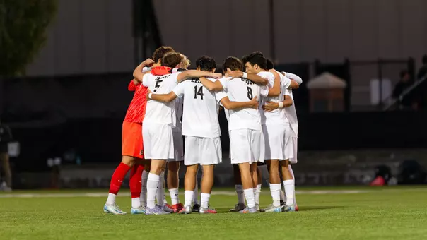 Men's Soccer Team Huddle