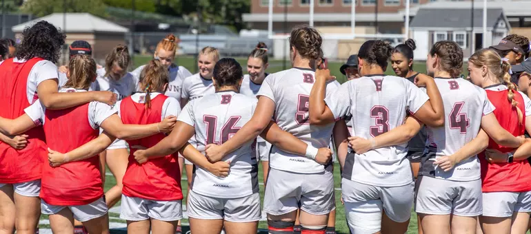Women's Rugby Group Huddle