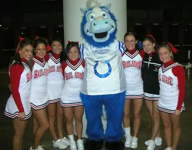 Coed Cheerleaders with Big Blue