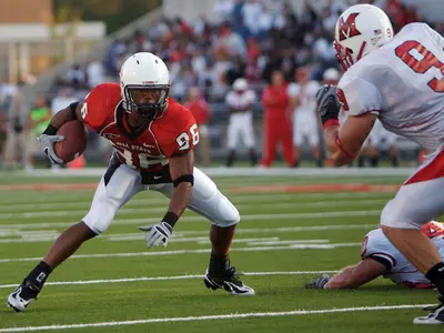 Three Football Players Receive All-America Honors