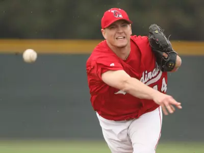 Baseball Splits Doubleheader, Heyne Breaks Saves Record