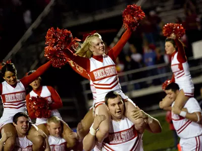 Coed Cheerleaders Brittney Hobbs and Andy Blanton
