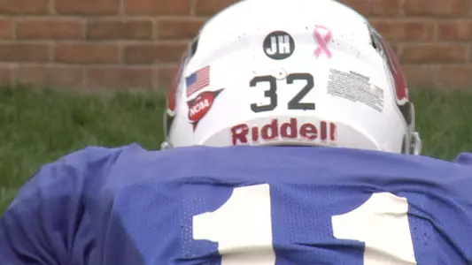Football Team Honors the Memory of John Huffer