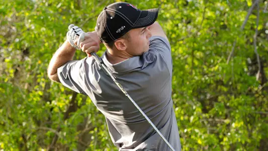 Men?s Golf Third with 18 Holes Left at MAC Tourney