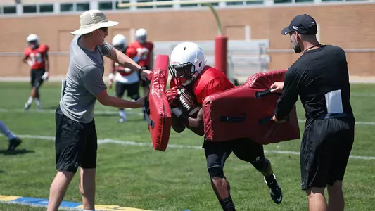 Football Practices In Full Pads Sunday