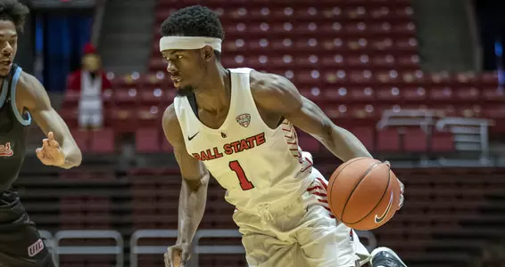 K.J. Walton drives the basketball for Ball State 2020