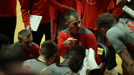 CoachWhitfordTeamHuddle