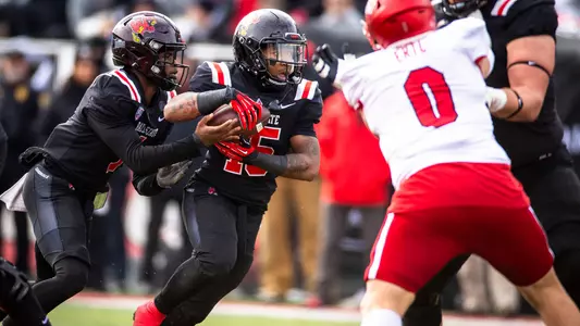 The Ball State football team competes against the Miami Redhawks at Scheumann Stadium on November 25, 2023. Photo by Bobby Ellis.