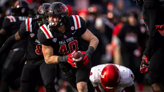 The Ball State football team competes against the Miami Redhawks at Scheumann Stadium on November 25, 2023. Photo by Bobby Ellis.