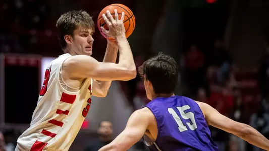 The Ball State men's basketball team competes against Goshen at Worthen Arena on November 7, 2023. Photo by Bobby Ellis.