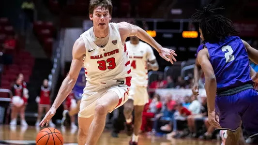 The Ball State men's basketball team competes against Goshen at Worthen Arena on November 7, 2023. Photo by Bobby Ellis.