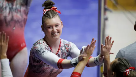 Ashley Szymanski high five vs. EMU