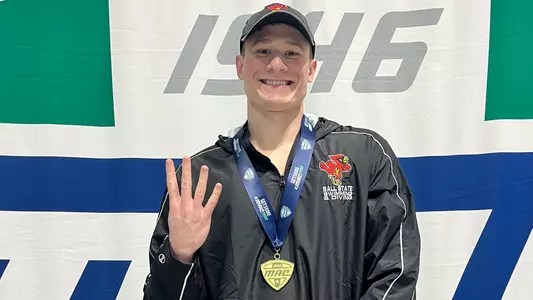 Joey Garberick - MAC 100 Breaststroke Champion