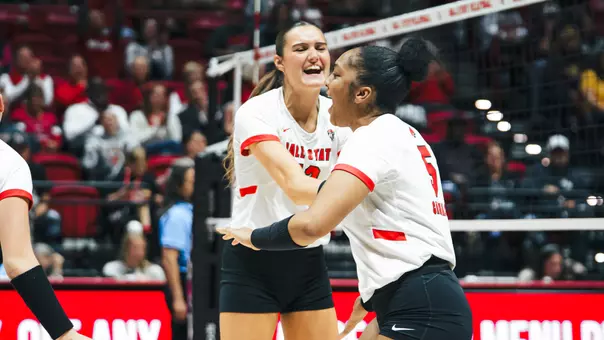 Ashby and Crull celebrate a point vs. CMU
