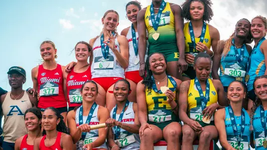 4x400 relay team on the podium at 2025 MAC Outdoor Championships