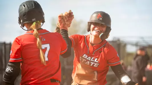 Pietrzak and Mulholland High Five at Home Plate