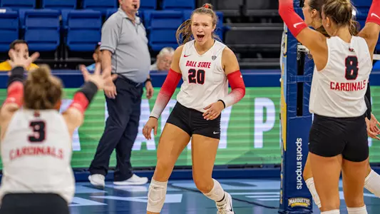 Carson Tyler celebrates one of her career-high 26 kills versus JMU