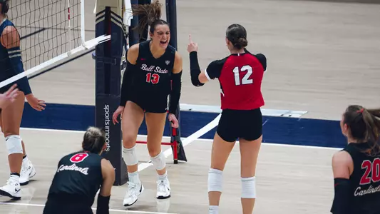 Gwen Crull & Sophie Ledbetter celebrate vs. Akron
