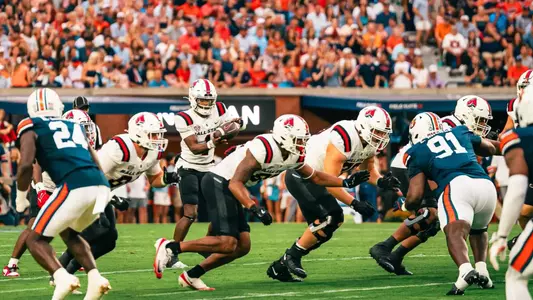 Kelly and offensive line at Auburn