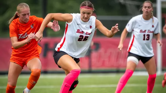 Annika Klauss dribbles the ball against a Bowling Green defender