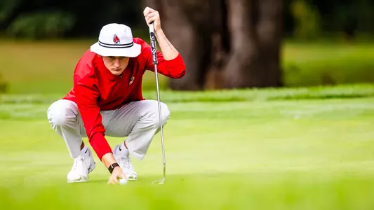 Brayden Lamborne lining up a putt at the Earl Yestingsmeier Invitational