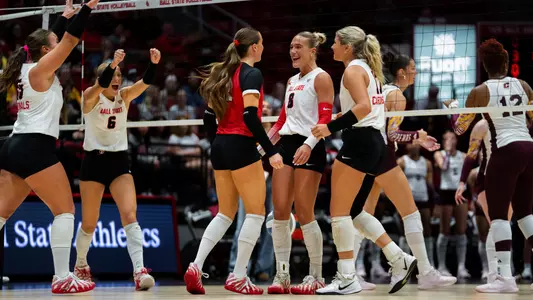 Women's Volleyball team celebrating a point in the Oct. 10 won over Central Michigan at Worthen Arena