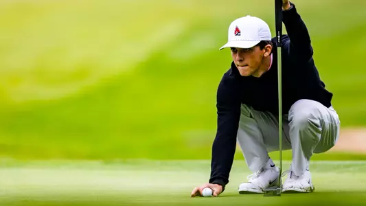 Cameron Chattin lining up a putt at the Earl Yestingsmeier Invitational at the Delaware Country Club