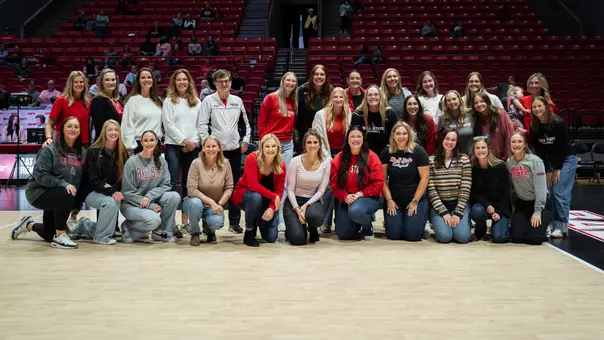 Ball State women's volleyball alumni pose for a picture during the team's annual Alumni Match in Worthen Arena on Oct. 23, 2026.