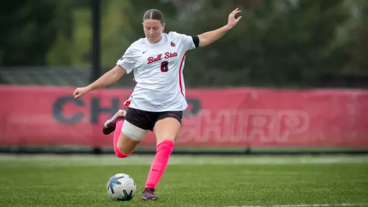 Audrey Goodyear looks to boot the ball in a soccer match