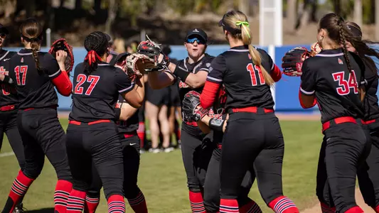 Ball State team high five line