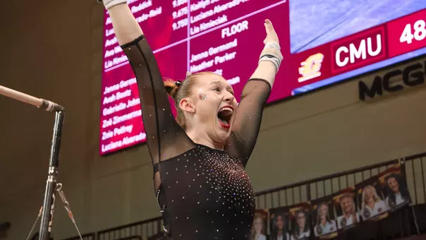 Ashley Szymanski on bars at Central Michigan