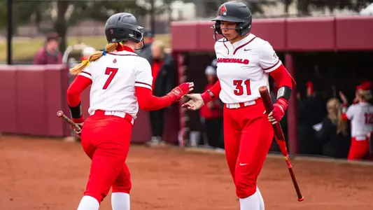 Maia Pietrzak and Meagan Ramos; Ball State softball game action; at Central Michigan, Game 1 on March 21, 2026