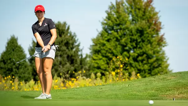 Sarah Gallagher chipping at Brittany Kelly Classic