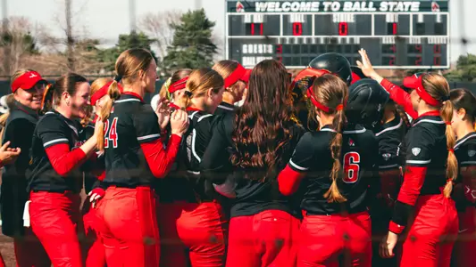 Ball State softball team celebrates a home run att he Ball State Softball Stadium