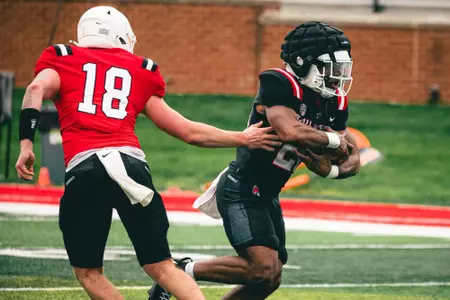 Bodie Derrer gives to Johnny Thompson Jr.