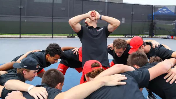 Men's Tennis Huddle Photo MAC Tourney Buffalo