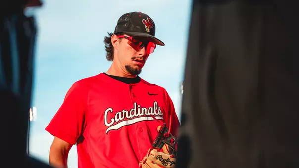 Brett Griffiths against Kent State on April 17th, wearing a red jersey.