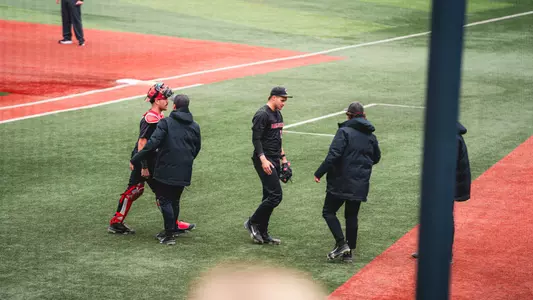 Zach Kwasny and Max Kalk walk off the field after an inning against Kent State on April 19th.