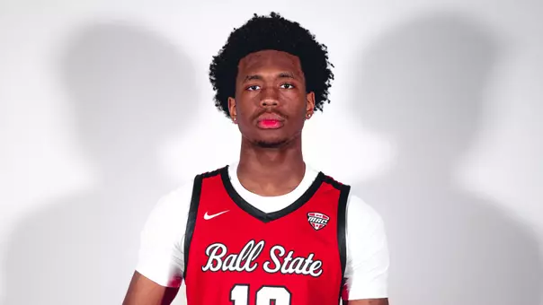 Jaden Smith in a red Ball State basketball uniform in front of a white background