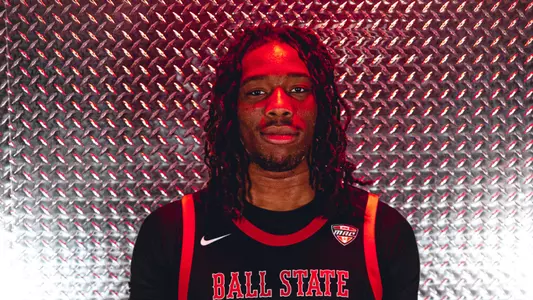 Babatunde Durodola in a black Ball State men's basketball jersey