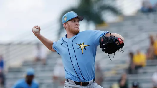 Ty Johnson in a Tampa Bay Rays uniform throwing a pitch