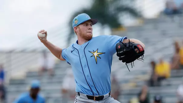 Ty Johnson in a Tampa Bay Rays uniform throwing a pitch
