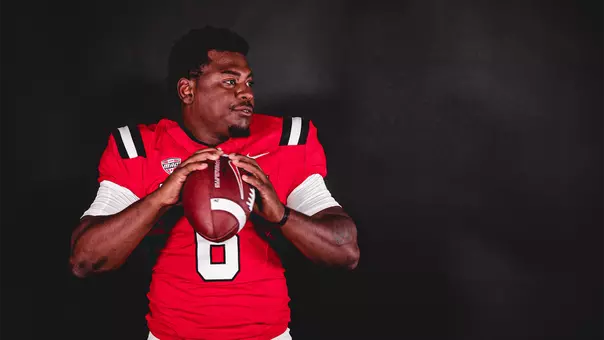 Keldric Luster Posed Shot with Football