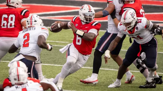 Keldric Luster scrambles in the pocked against Stony Brook