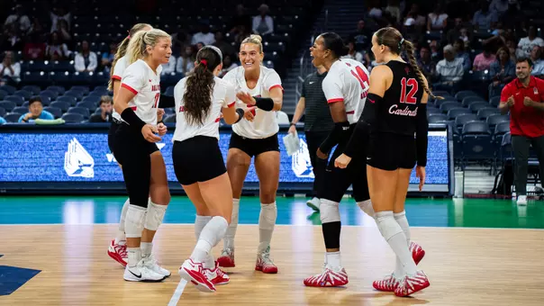 The women's volleyball team celebrating a point in the Aug. 29 win over Xavier