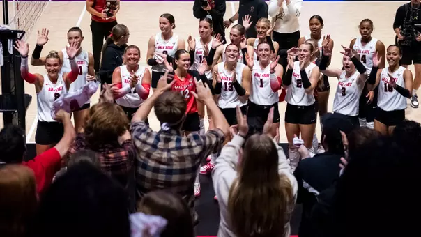 The Ball State women's volleyball team celebrates its Sept. 25, 2026 victory over Western Michigan with its fans.