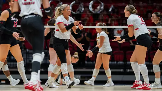 Camryn Wise celebrates one of her career-high 16 kills with setter Reese Axness in the Sept. 26, 2026 sweep of Western Michigan.